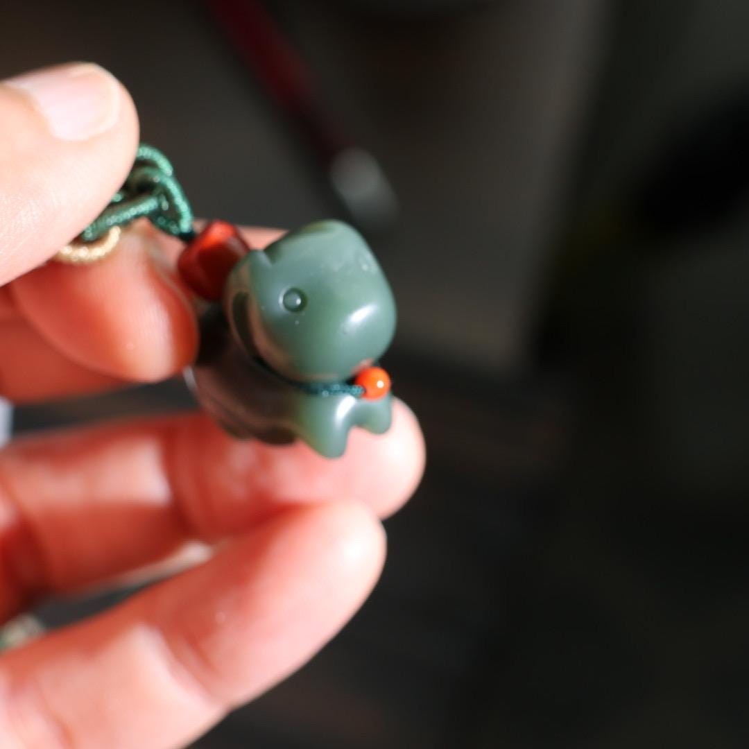 Nephrite dark green Jade puppy pendant