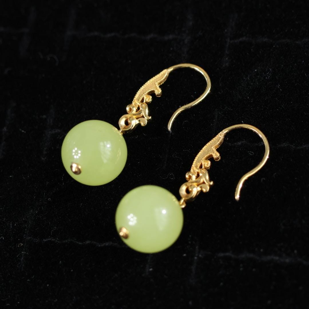 Antique style yellow nephrite and solid gold phoenix earrings 18k