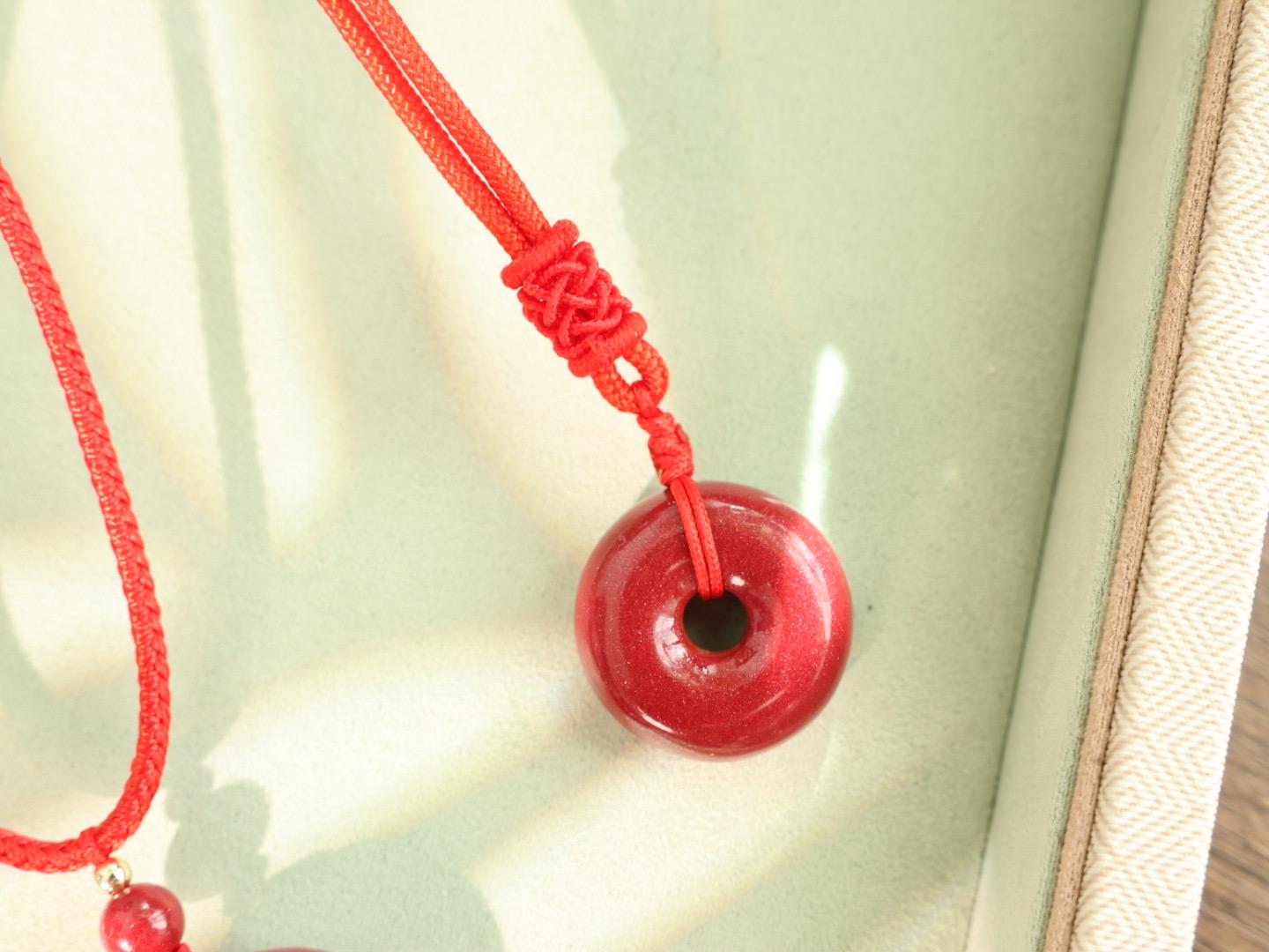 Cinnabar donut pendant | positive energy pendany