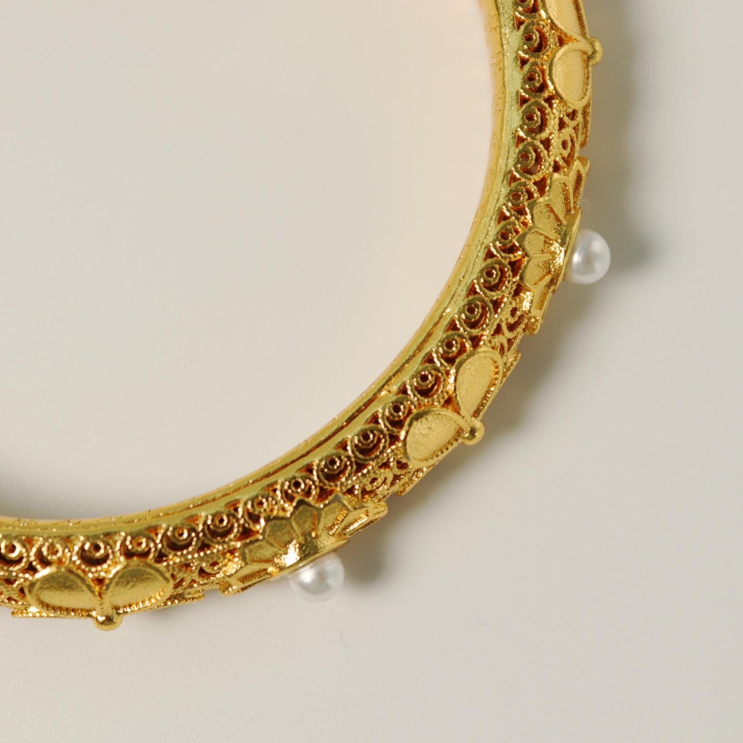 Chinese style pearl and 24k gold bangle with heart sutra inscription