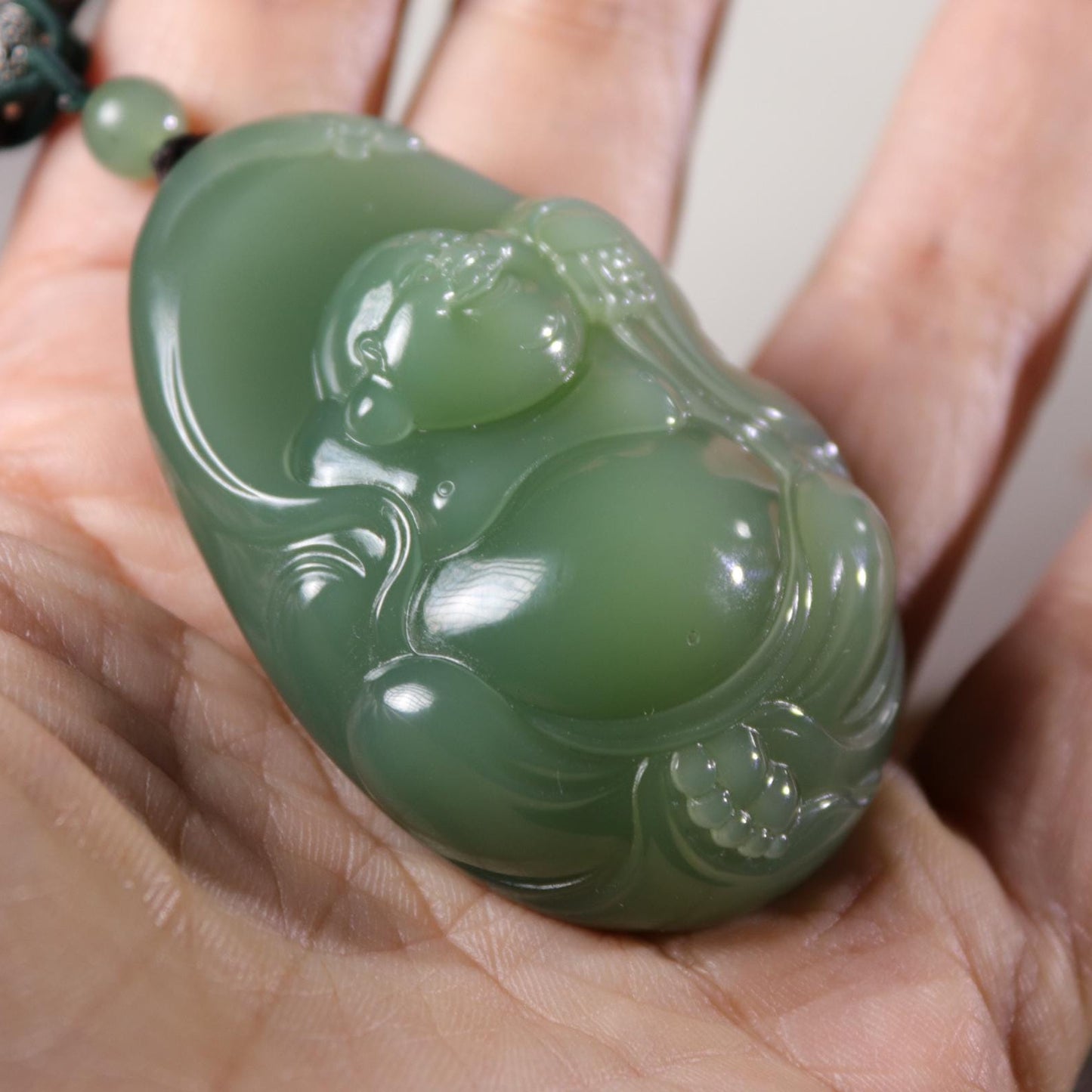 Certified green jade Buddha pendant