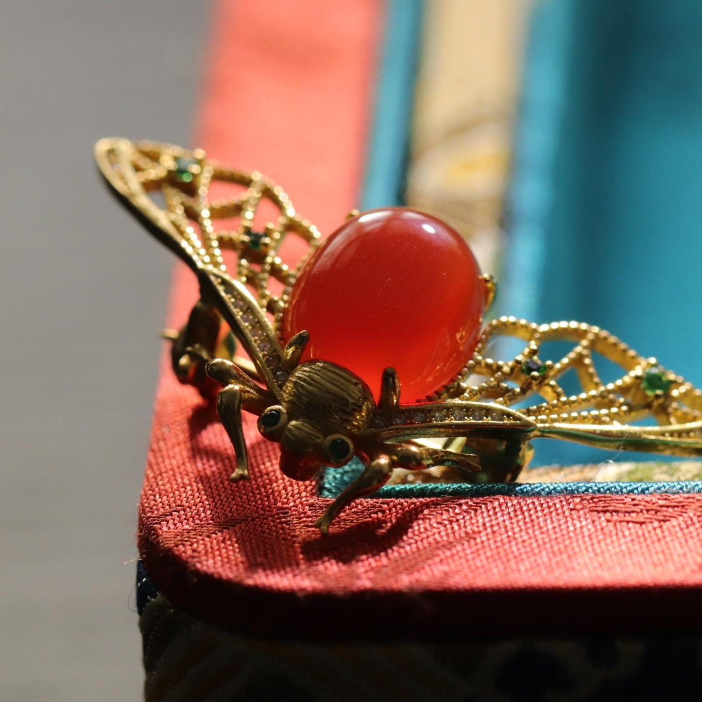 Baoshan icy red agate bee brooch