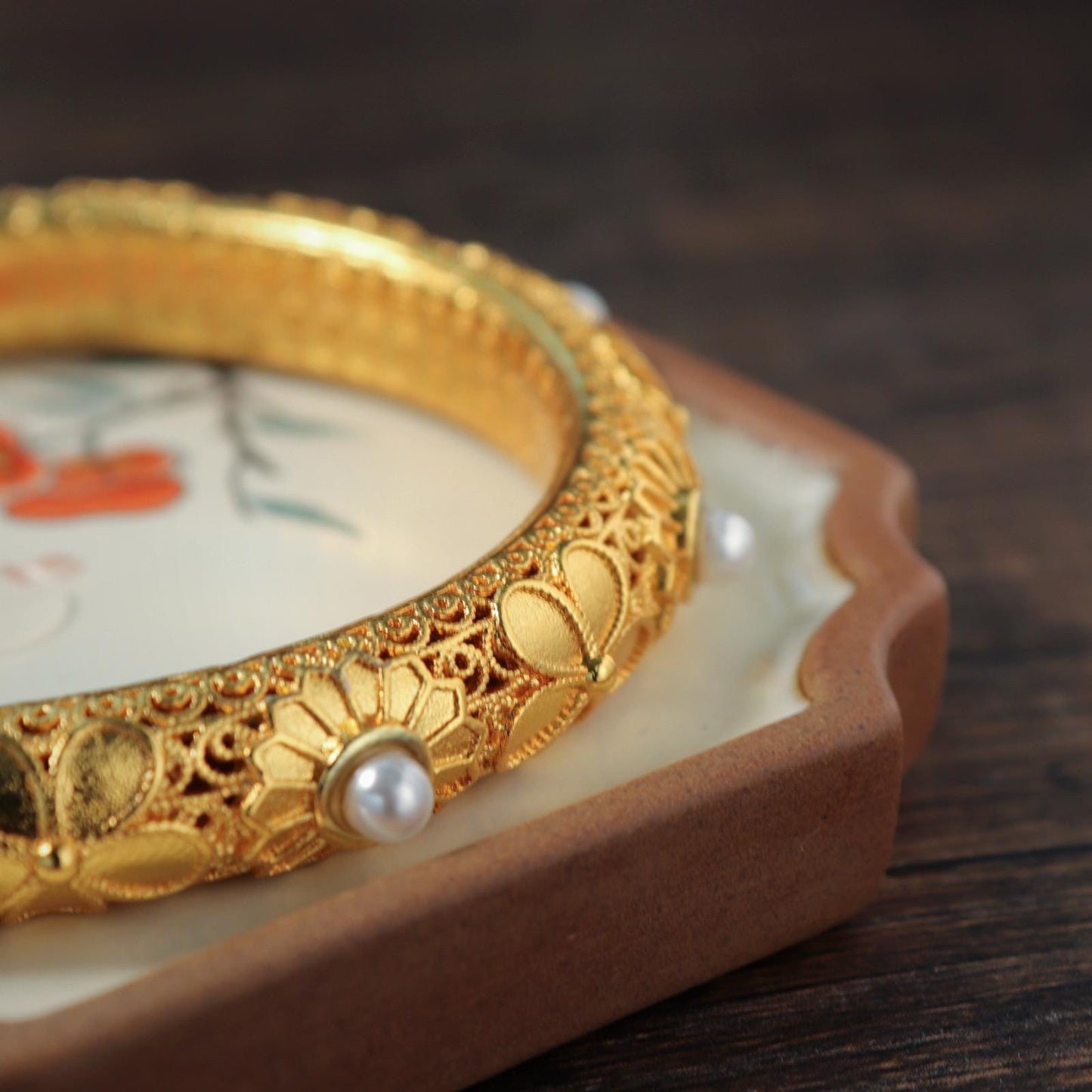 Chinese style pearl and 24k gold bangle with heart sutra inscription