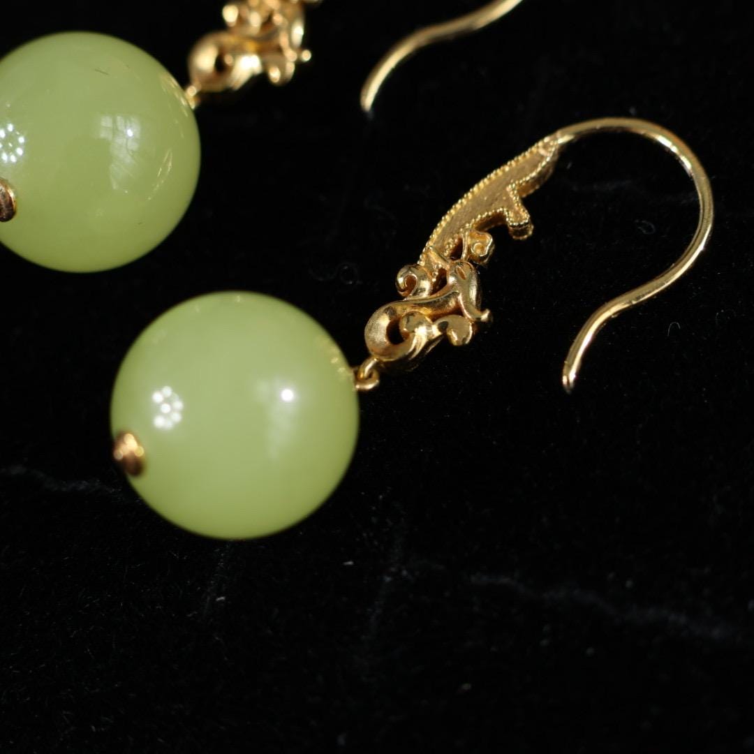 Antique style yellow nephrite and solid gold phoenix earrings 18k