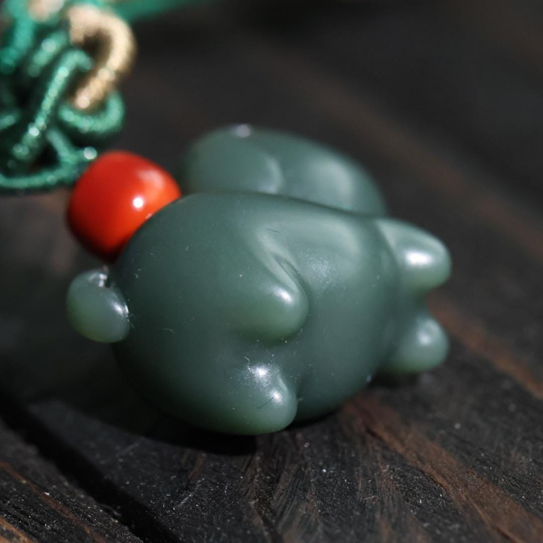 Nephrite dark green Jade puppy pendant