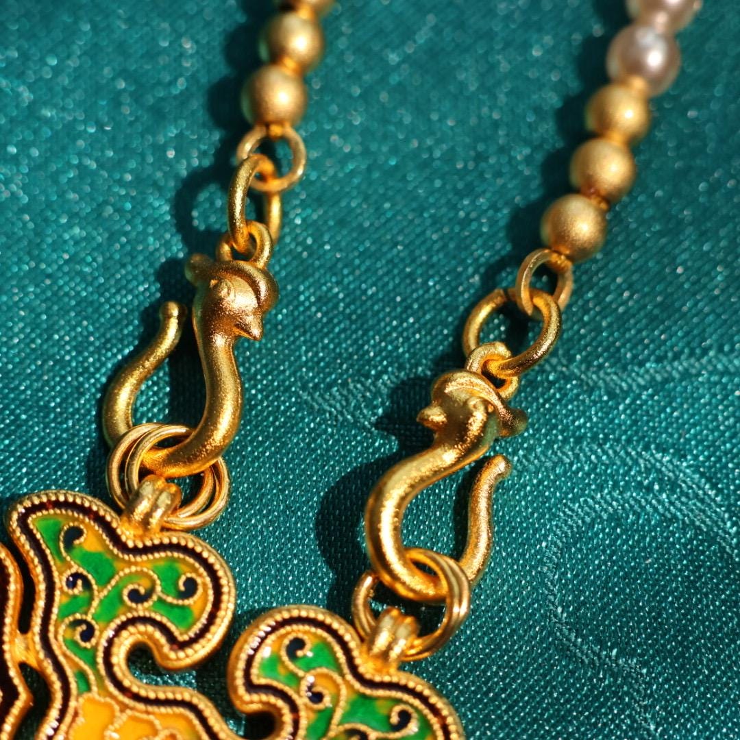 Traditional Chinese longevity lock pendant with faux pearl necklace