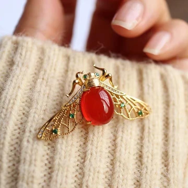 Baoshan icy red agate bee brooch