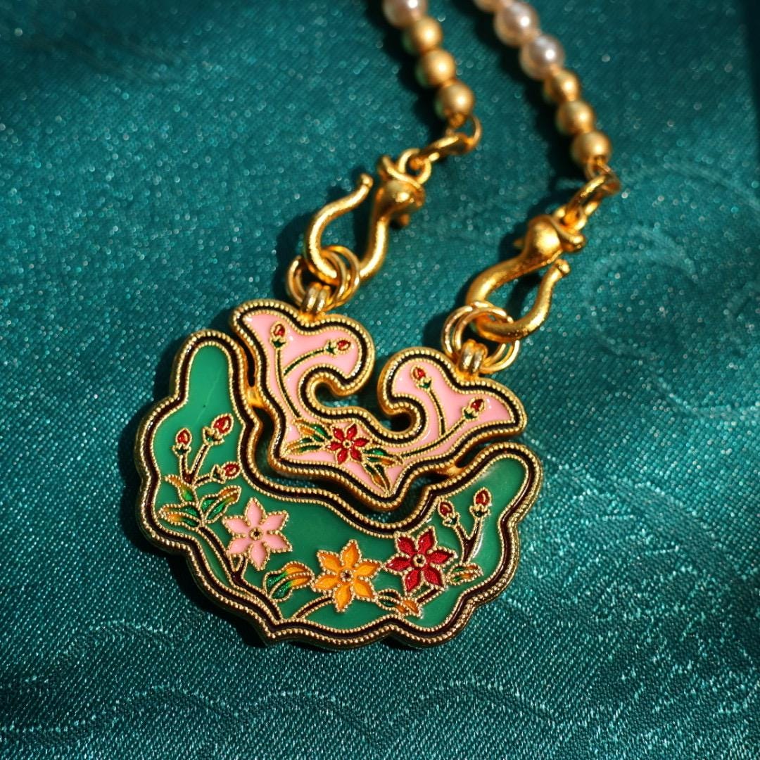 Traditional Chinese longevity lock pendant with faux pearl necklace