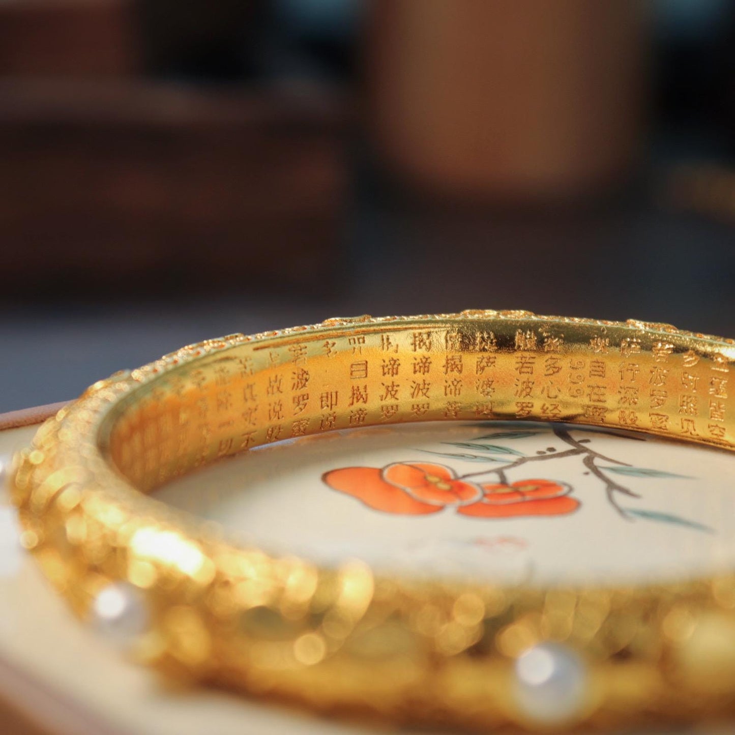 Chinese style pearl and 24k gold bangle with heart sutra inscription