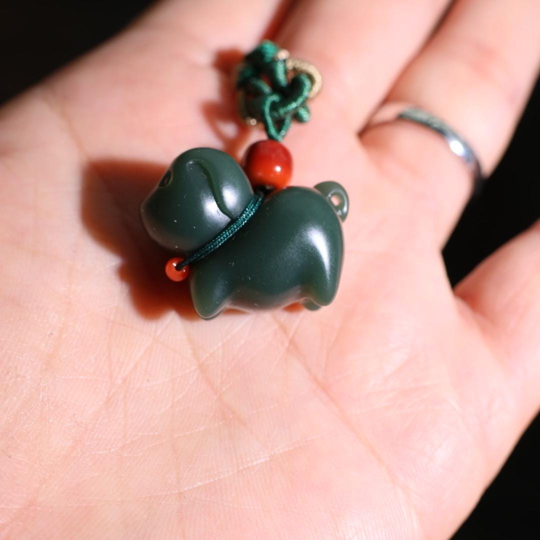 Nephrite dark green Jade puppy pendant