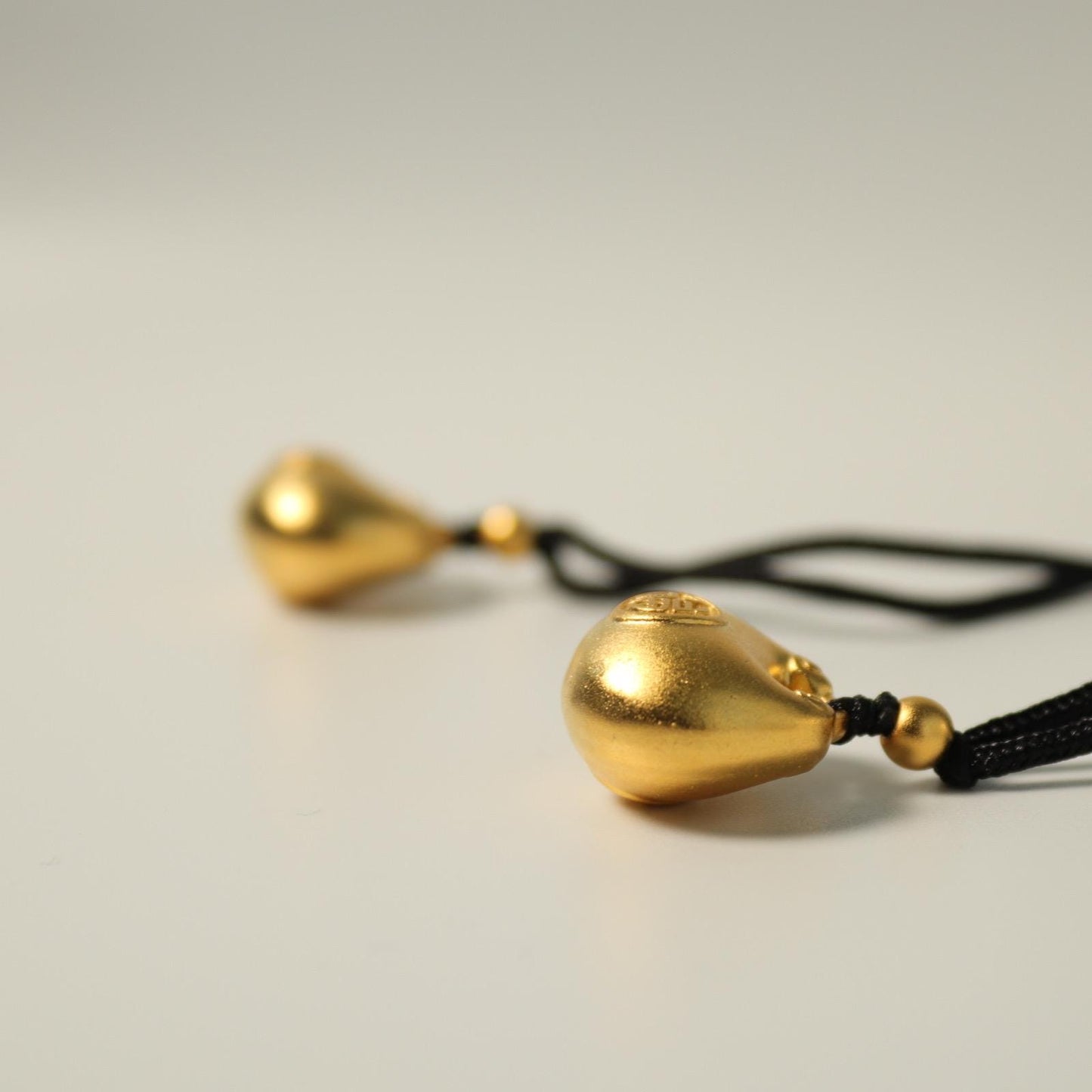 24K gold blissful lock pendant