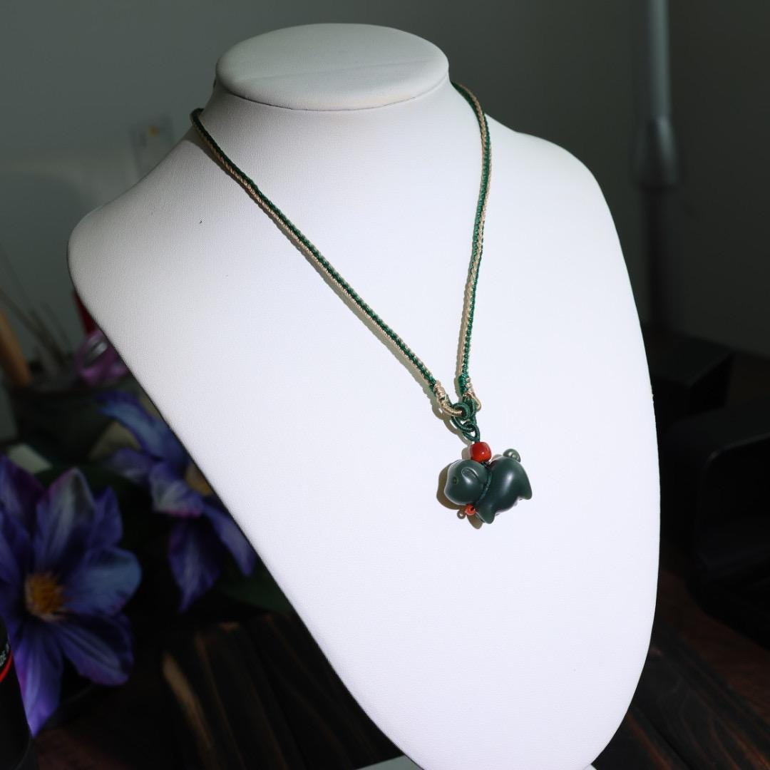 Nephrite dark green Jade puppy pendant