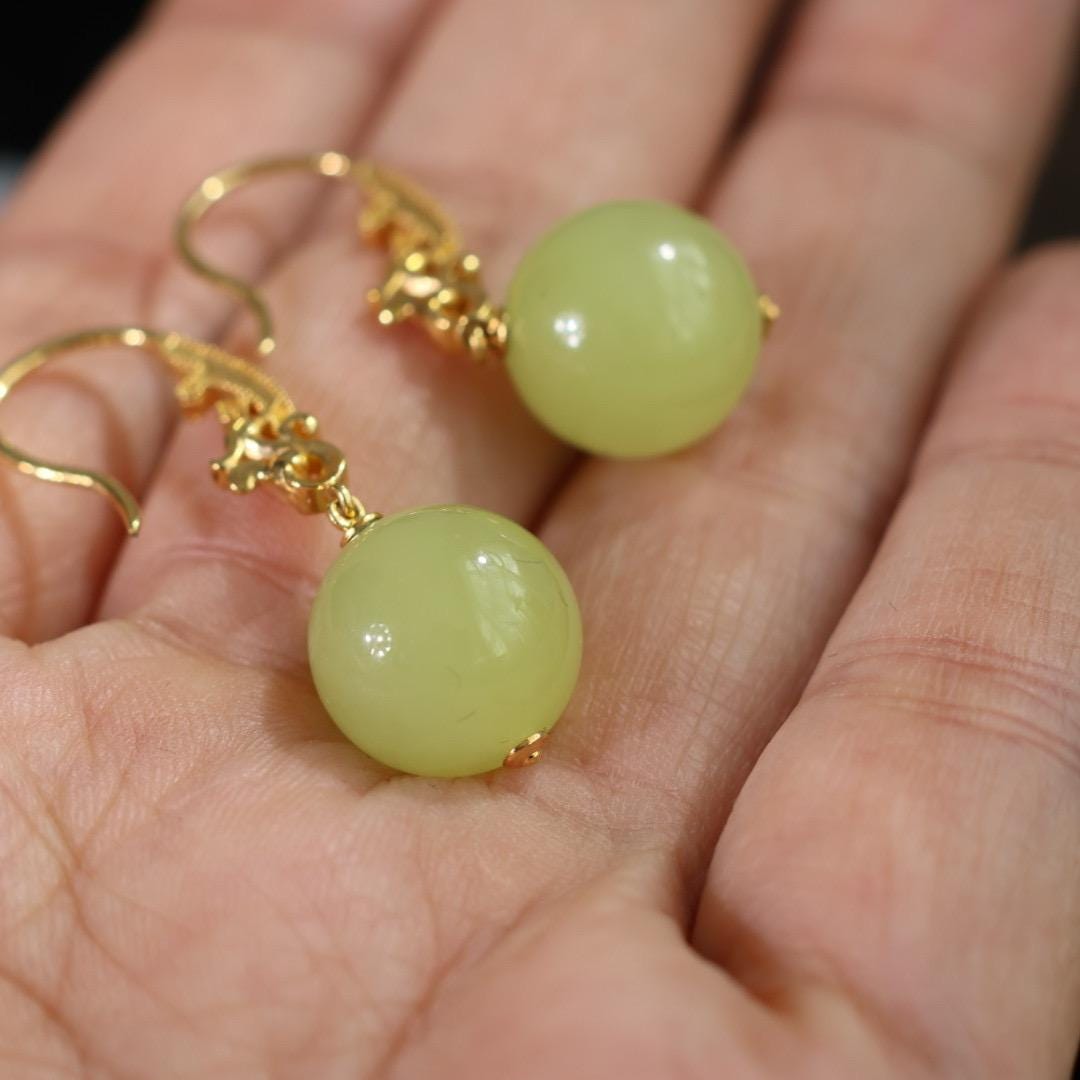 Antique style yellow nephrite and solid gold phoenix earrings 18k