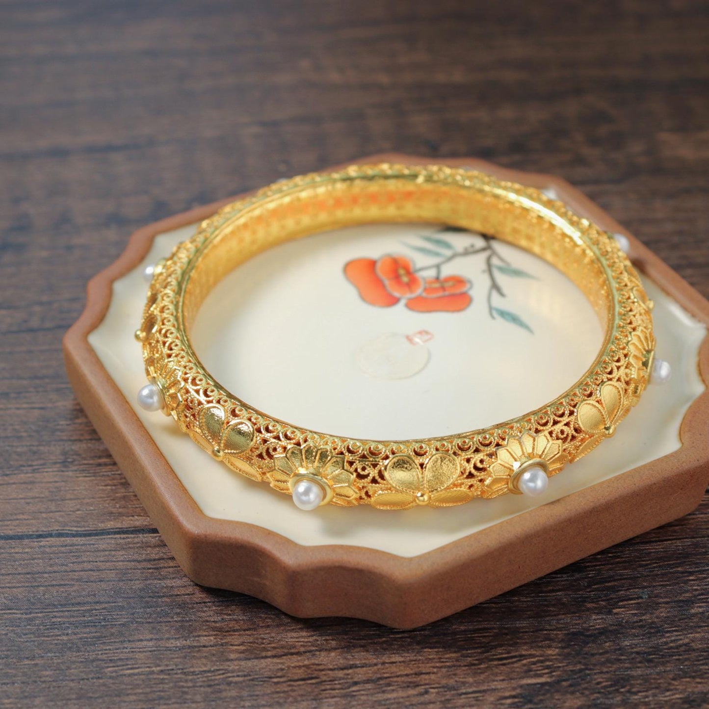 Chinese style pearl and 24k gold bangle with heart sutra inscription