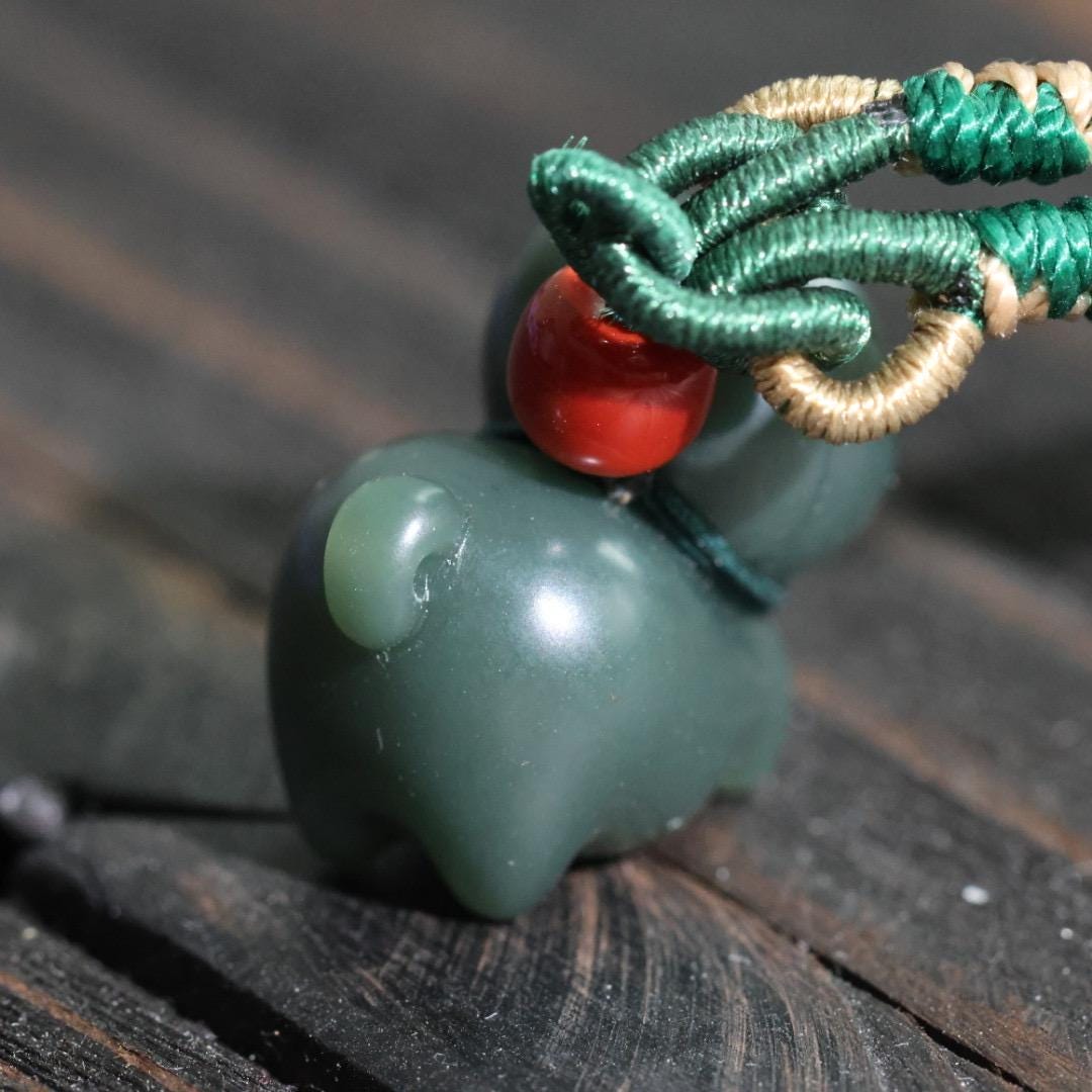 Nephrite dark green Jade puppy pendant