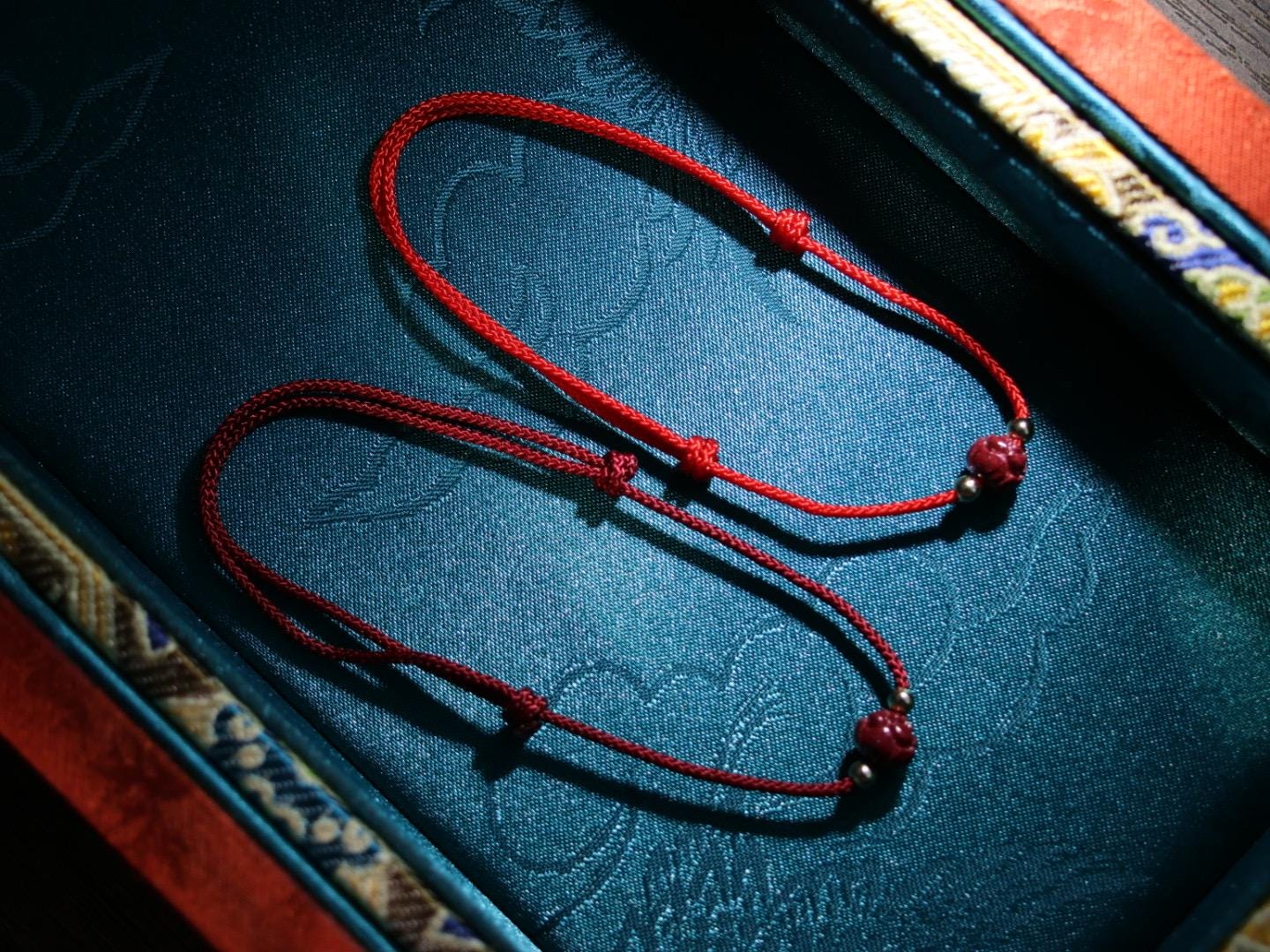 Auspicious adjustable red cord bracelet with cinnabar lotus bead/ fortune bracelet