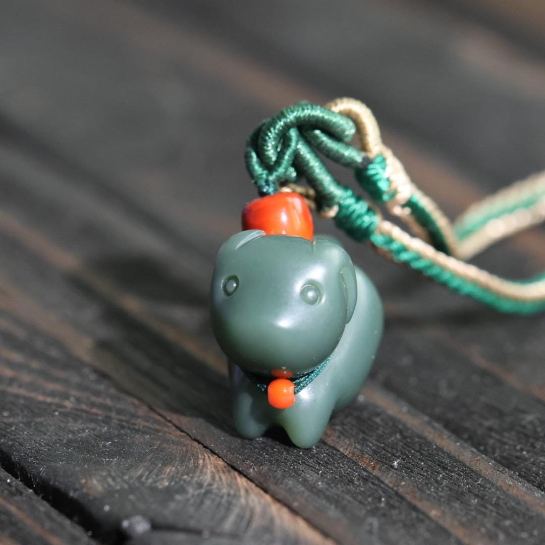 Nephrite dark green Jade puppy pendant